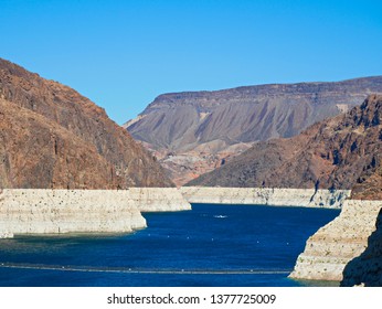 Low Water Line Of Colorado River At Hoover Dam Showing The Extent Of Water Loss Or Drought, Arizona And Nevada
