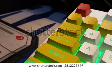 A low-angle macro close-up of a custom mechanical computer keyboard focusing on the left control cluster, including QWERTY keys, yellow Caps Lock, Shift, and Tab keys. Featuring a prominent red Escape button and illuminated by a bright neon green LED backlight gradient, this layout represents gaming controls, cyber aesthetics, and coding setups.