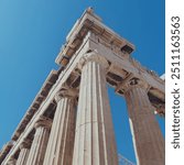 Low-Angle Shot of the Parthenon in Athens, Greece Against a Bright Blue Sky