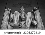 A low-angle shot of the stone Statue of Abraham Lincoln at Lincoln Memorial, Washington DC