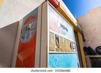 Lowell, Arizona, USA - December 13 2019: A Vintage Pepsi Vending Machine In The Harsh Desert Sun.