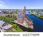 Lowell historic downtown, Marrimack River and Mills aerial view in Lowell, Massachusetts, USA.