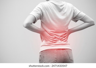 Lower back pain is usually caused by a muscle injury. broken pillow - Powered by Shutterstock