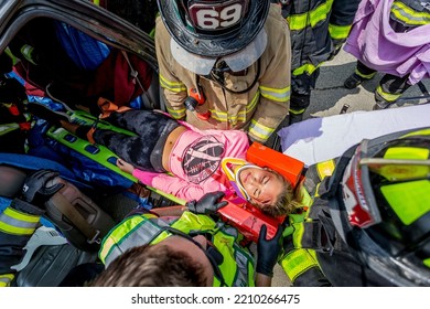 Lower Burrell, Pa., USA - May 3, 2018:  MOCK DUI TRAINING For Fire, Police, And Ems Paramedics At A Staged Car Accident With Injuries And Fatality, Parents Being Restrained