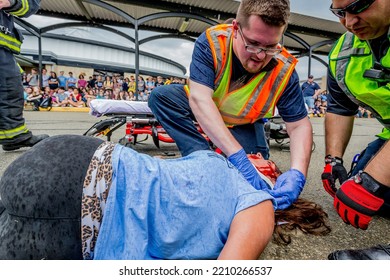 Lower Burrell, Pa., USA - May 3, 2018:  MOCK DUI TRAINING For Fire, Police, And Ems Paramedics At A Staged Car Accident With Injuries And Fatality, Parents Being Restrained