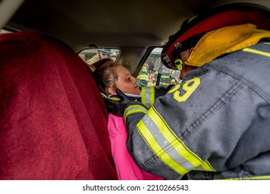 Lower Burrell, Pa., USA - May 3, 2018:  MOCK DUI TRAINING For Fire, Police, And Ems Paramedics At A Staged Car Accident With Injuries And Fatality, Parents Being Restrained