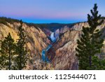 The Lower Falls in Yellowstone Grand Canyon as seen from Artists Point.  The Yellowstone river is part of the park in Wyoming.