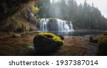 Lower Lewis water Falls raging under ledge Skamania County under rock ledge