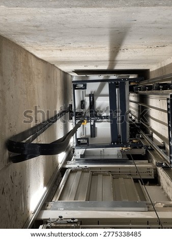 Lower part of elevator, view from below, manoeuvring cables