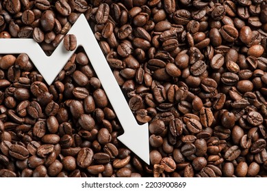 Lower Prices For Black Coffee Beans. Poor Harvest Of Coffee Beans, World Food Crisis. Decline In The Cost Of Coffee Futures And Derivatives.Decrease Graph, Arrow Pointing Down