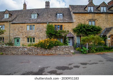 Lower Slaughter 29 July 2021 Uk. Village in the Cotswold district of Gloucestershire,The mill is built of red brick, most of the 16th and 17th century homes in the village use Cotswold limestone. 