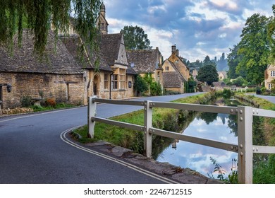 Lower Slaughter in the Gloucestershire Cotswolds is a quaint village that sits beside the little Eye stream and is known for its unspoilt limestone cottages in the traditional Cotswold style.