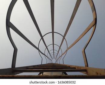 lower view of ladder boiler stack, air pollution concept