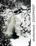 Lower Yellowstone Falls in Winter covered in heavy snow