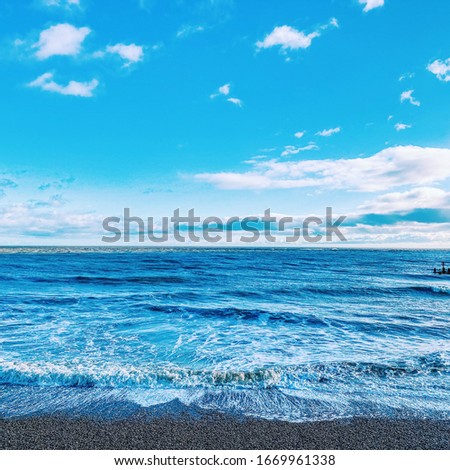 Lowestoft beach waves breaking on shoreline