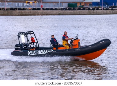 LOWESTOFT, SUFFOLK, UK - JULY 25, 2009: Lowestoft RIB East Point 1, Acting As Guard Boat During Offshore Power Boat Racing, Returns To The Town's Harbour.