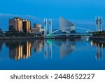 The Lowry footbridge and Imperial War Museum North, Salford Quays, Salford, Manchester, England, United Kingdom, Europe
