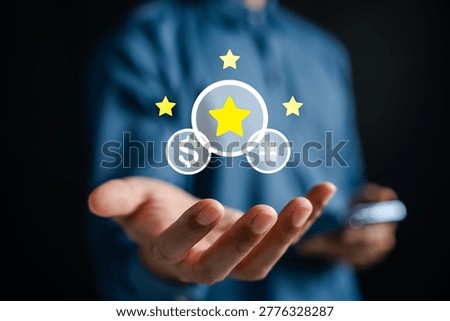 Loyalty points and customer rewards program solution. Man holding digital icons with star, dollar, and gift box for marketing.