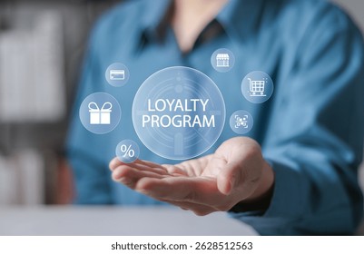 Loyalty program concept, Customer Engagement. Businessman holding loyalty program icon on virtual screen.