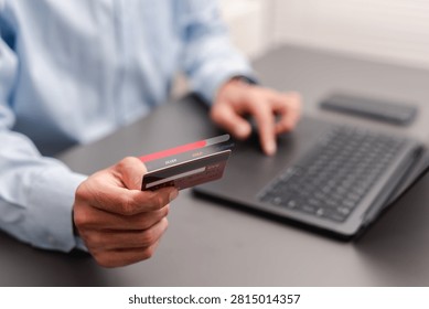 Loyalty program and membership tier concept. Businessman holding credit card with VIP upgrade progress bar.
