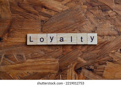 Loyalty Text On Wooden Square, Popular Business Quotes