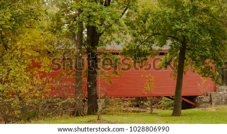 Loy;s Station Covered Bridge is in Frederick Count y Maryland near Thurmont. The fall colors are just on the verge of changing in mid October.
