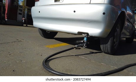 LPG To Car, Auto Refuel. Car At Gas Station Being Filled With Fuel, Fill Up Of Liquefied Petroleum Gas, LPG, Selective Focus.