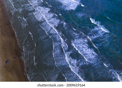 Lpoking Down Above Diagonal Waves Crashing Along Empty Beach Over South Padre Island Beach , Texas , USA  Aerial Drone View Above Gorgeous South Texas Beach Vacation Destination