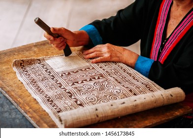 Luang Prabang, Laos - Hilltribe Laotian Woman Working On Batik Fabric Painting. Culture Tourism At Ock Pop Tok Handicraft Center