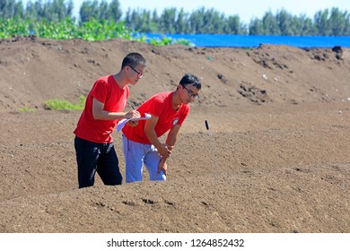 Luannan County - August 24, 2018: Two College Students Are Measuring Aerobic Composting Temperature, Luannan County, Hebei Province, China