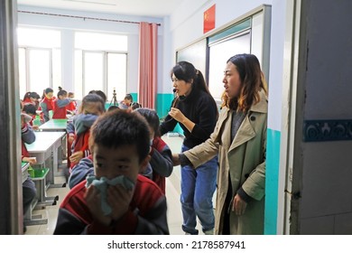 LUANNAN COUNTY, China - November 3, 2021: Teachers Organize Students For Fire Emergency Evacuation Drill, North China