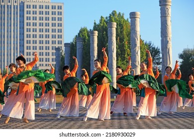 LUANNAN COUNTY, China - October 7, 2021: Ladies Practice Fan Dance In The Park, North China