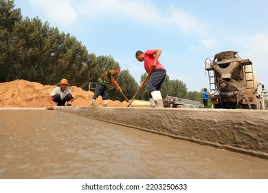 LUANNAN COUNTY, China - September 3, 2021: Workers Work Hard At Construction Sites In North China