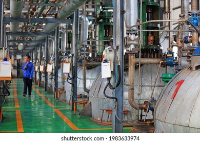 LUANNAN COUNTY, Hebei Province, China - April 15, 2019: The Workers Are Working In The Production Workshop In A Biodiesel Production Plant.