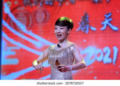 LUANNAN COUNTY, Hebei Province, China - January 28, 2021: Gushu Rap Performance On The Stage, Traditional Chinese Style Art Performance.