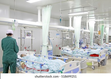 Luannan County - June 18th: nurses in intensive care unit busy, June 18th, 2015, Luannan County, Hebei Province, China