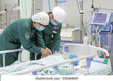 Luannan County - June 18th: Nurses In Intensive Care Unit Busy, June 18th, 2015, Luannan County, Hebei Province, China
