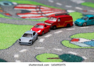 Lubartow, Poland - 20 November 2019: Toy Car Traffic Jam In Front Of Roundabout On Car Town Carpet Street