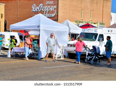 Lubbock, Texas / USA: Circa September 2019
People Enjoying A Shopping Trip To An Open Air Farmers Market Offering Fresh, Organic Fruits And Vegetables.