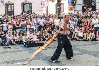 Lublin, Poland - July 27, 2014: Aerial Manx With Burning Whip At New Circus And Busking Festival Carnaval Sztukmistrzow