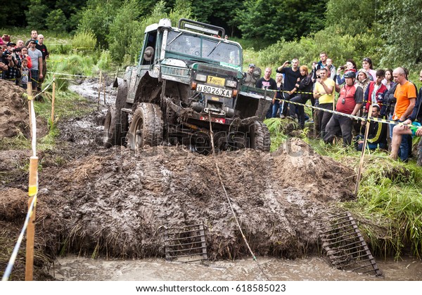LUBOTIN,\
UKRAINE - JULY 23, 2016: RFC Ukraine Wild Boar Challenge 2016.\
Custom built TR3 Rally car passes a hard\
pit.