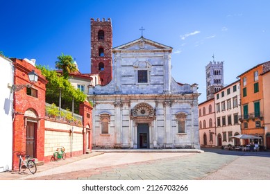 Lucca, Italy - View of Piazza San Giovanni and famous St Martin Cathedral tower in background, postcard of Tuscany.