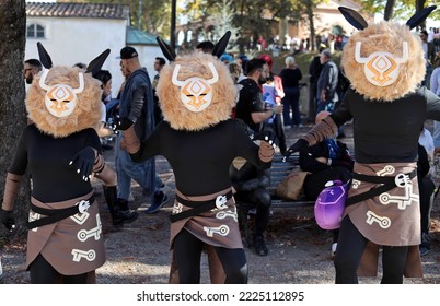 Lucca, Tuscany, Italy - October 30, 2022: Cosplayers Dressed As Hilichurls, Characters From The Video Game Genshin Impact At The Lucca Comics And Games 2022 Cosplay Event.