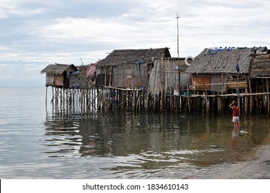 Lucena City, Quezon, Philippines - October 11, 2020: Over Water Stilt Bajau Shanty Houses Built By Indigenous People In The Philippines. Long Shot