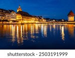 Lucern city with famous Chapel Bridge. Lucerne city view. Canton of Lucerne. Lucern Switzerland. Sunrise in historic city center of Lucerne with famous Chapel Bridge and lake Lucerne.