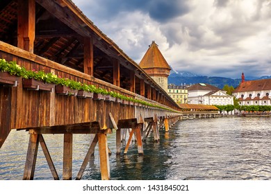 The Lucerne, Switzerland - Famous Wooden Chapel Bridge, Oldest Wooden Covered Bridge In Europe. Luzern