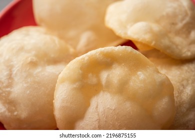 Luchi or Lusi is a deep-fried poori or flatbread, made of Maida flour, originating from Bengal