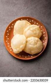 Luchi or Lusi is a deep-fried poori or flatbread, made of Maida flour, originating from Bengal