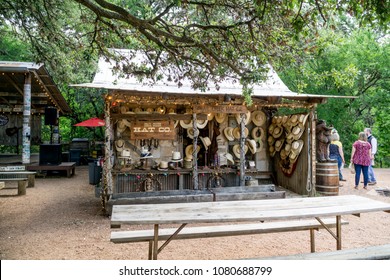 LUCKENBACH, TEXAS - APRIL 29th, 2018: Hat Company Selling Hats Next To The Outdoor Music Venue In Luckenbach Texas. Made Famous By The Song Luckenbach Texas By Waylon Jennings And Willie Nelson