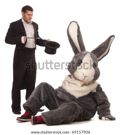 Luckless magician conjuring with a inconceivable rabbit over white background
